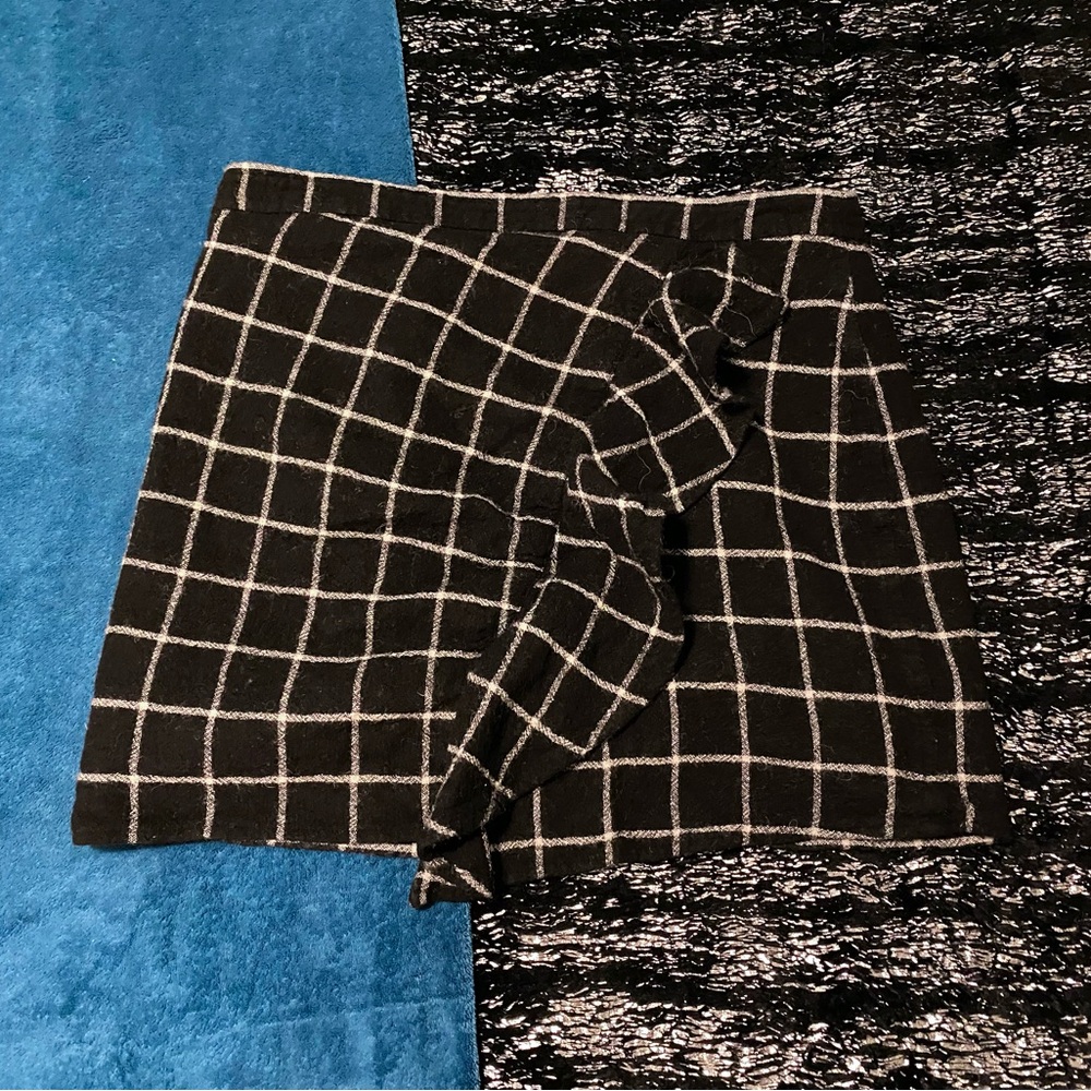 Brown and white plaid mini skirt with ruffles